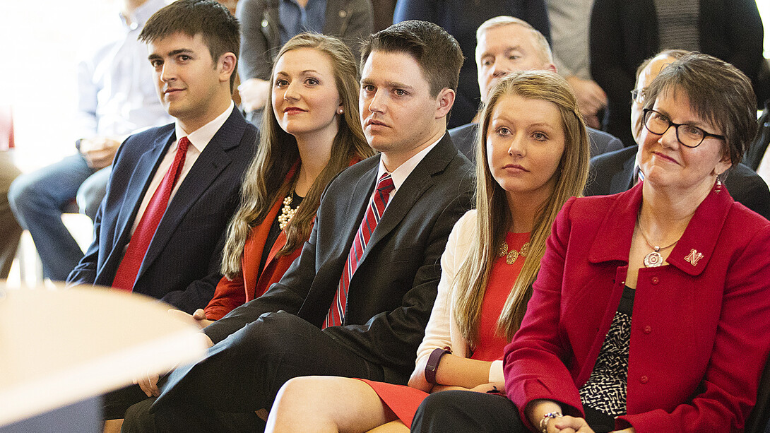 Ronnie Green's family watches during his acceptance remarks on April 6 in the Van Brunt Visitors Center. Pictured (from right) is Green's wife, Jane, and children, Reagan, Nate, Kelli and Justin.