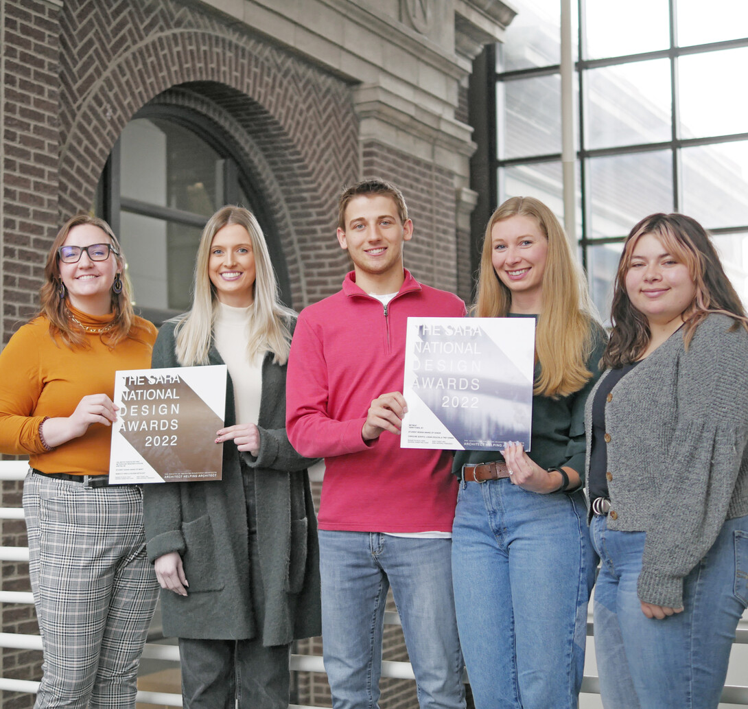 Rebecca Virgl, Keleigh Ketelhut, Caroline Goertz, Logan Dolezal and Trey Erwin pose with their awards.