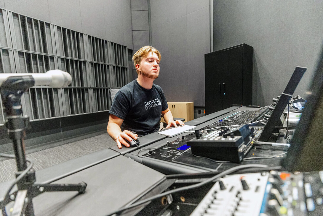 James Rasser, a vocal performance major, works at the mixing desk in the studio inside the Westbrook Music Building. Students in the Advanced Audio Recording and Production course used the new studio to record a four-song EP with local band Joyrager.