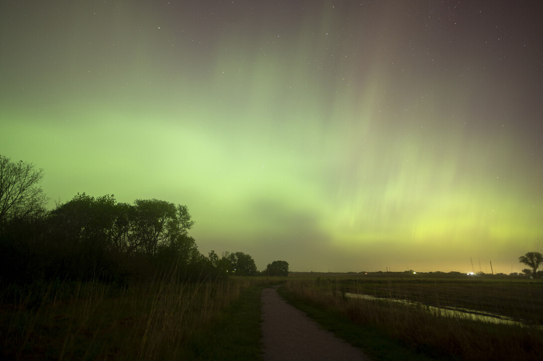 The solar flares that generated auroras in Nebraska on May 10-11 this year also produced electromagnetic interference that distorted sensor readings for soil moisture and hydrology monitoring. UNL now prevents that disruption after installing a neutron monitor. The device will be a major help for agricultural practices, irrigation management, and climate monitoring. 