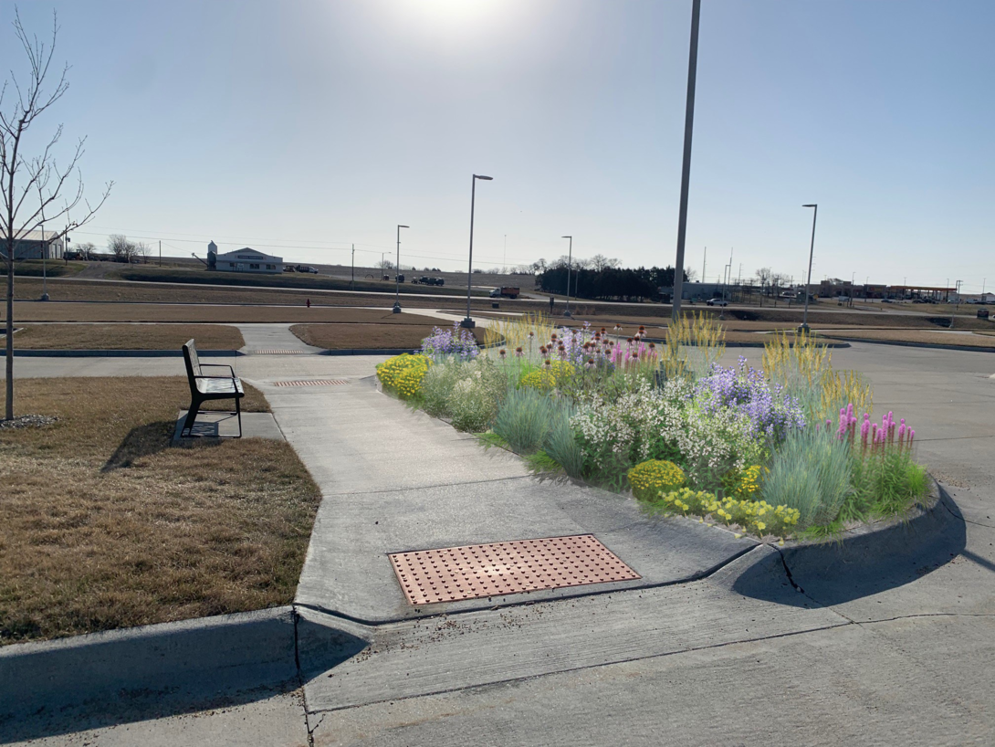 A rendering shows a potential landscape design for a "comfort station" at Syracuse Area Health Center.