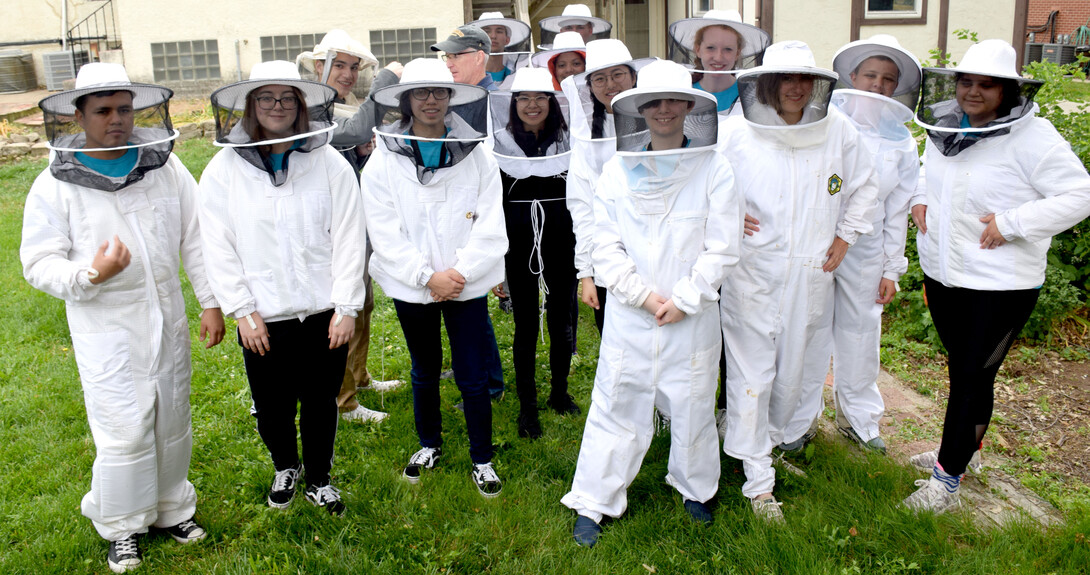 Young Nebraska Scientists learn about bee colonies during a Biology Explorations Camp.