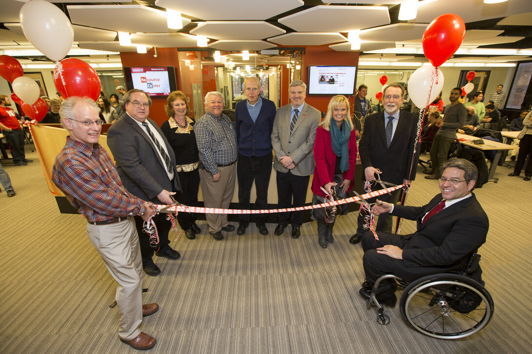 The Department of Chemistry celebrated the remodeling of Hamilton Hall's second floor chemistry laboratories and new resource center with a ribbon cutting. From left: Mark Griep, Dr. Jim Takacs, Peg Bergmeyer, Darrel Kinnan, Jim Carr, Jason Kautz, Alecia Kimbrough, Dan Hoyt and Lance Perez. 