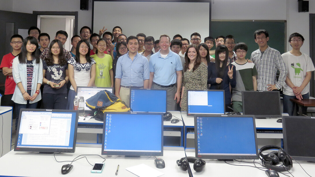 Members of the UNL Speech and Debate team are pictured with students during a class at Xi'an Jiaotong University in China.