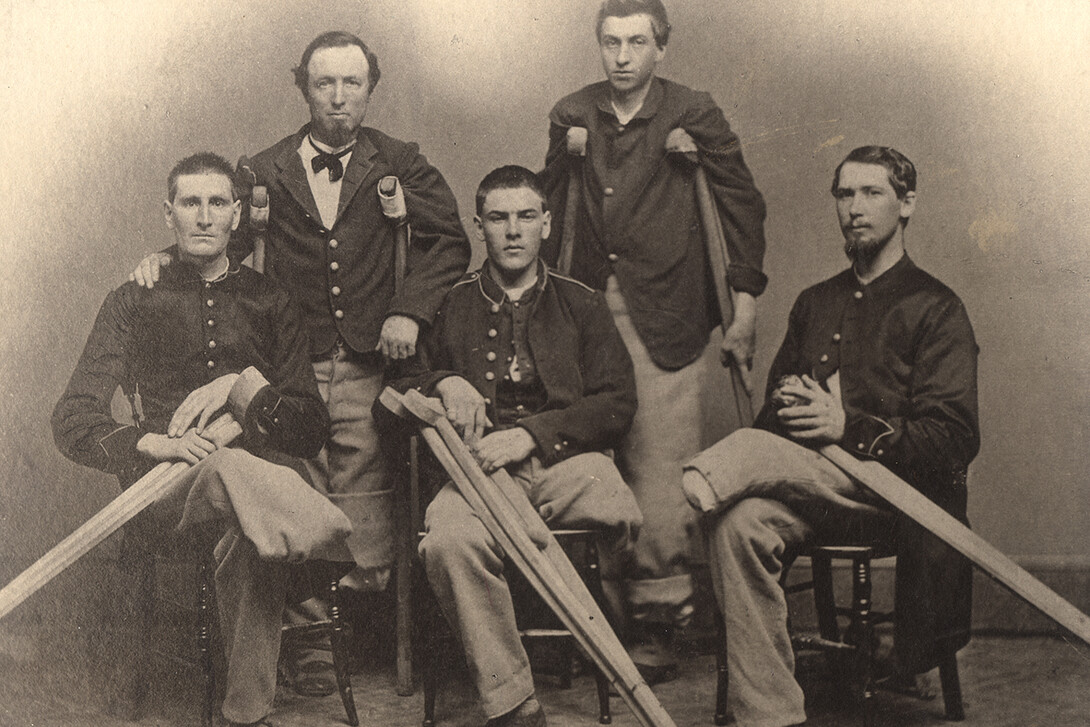 Civil War soldiers who lost limbs pose for a photo. The recovery of soldiers injured during the war is explored in the "Life and Limb: The Toll of the Civil War" exhibit, opening April 14 in Love Library.