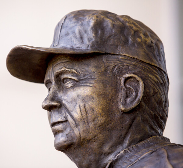 A commissioned statue of Hall-of-Fame football coach and former Cornhusker athletic director Bob Devaney was installed in the new East Memorial Stadium plaza Friday afternoon. 