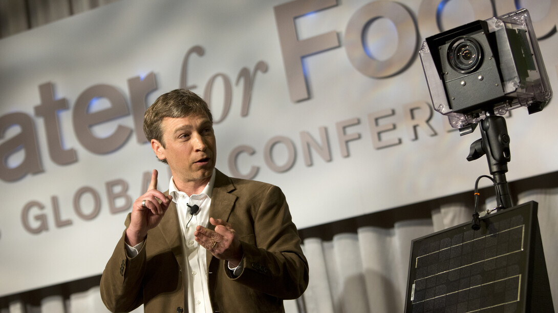 Michael Forsberg talks during the Water for Food conference in May 2013. Forsberg worked at Campus Recreation's Outdoor Adventures program when he was an undergraduate in 1987 to 1989.