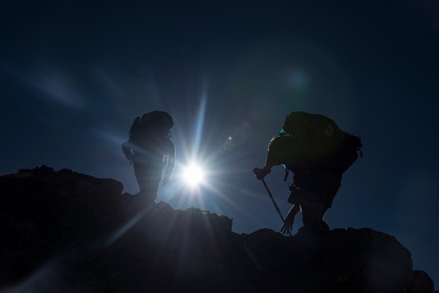 Mike Forsberg and Peter Stegen reach the summit of Grays Peak in Colorado. The duo is featured in the NET Television-produced documentary, "Follow the Water."