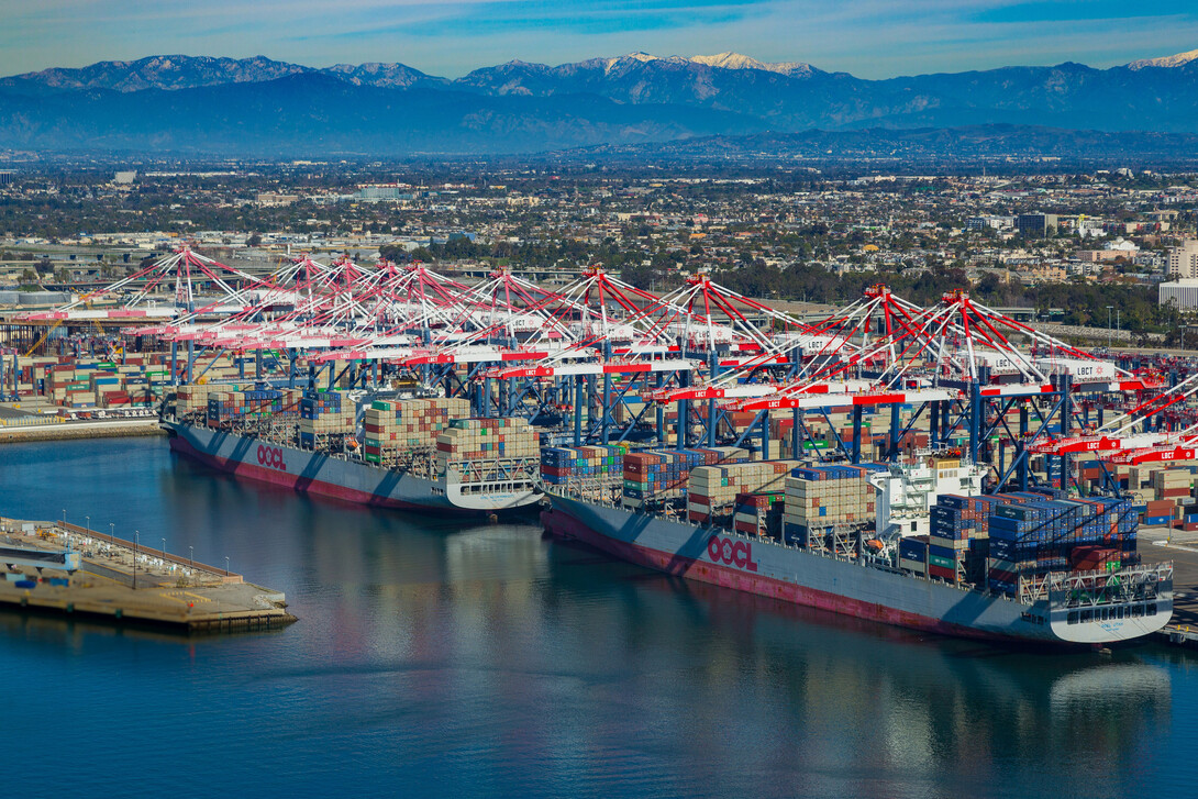 Port terminal is shown receiving cargo ships