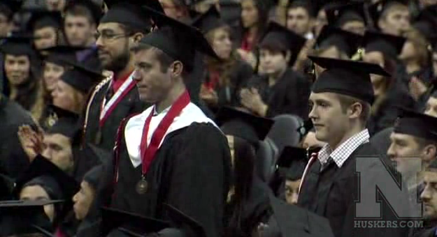 December 2013 grads stand for recognition during the Dec. 21 ceremony.