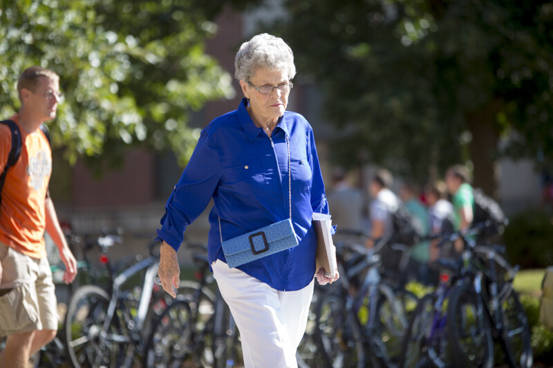 Jean Kops makes her way across the UNL campus following a recent class.