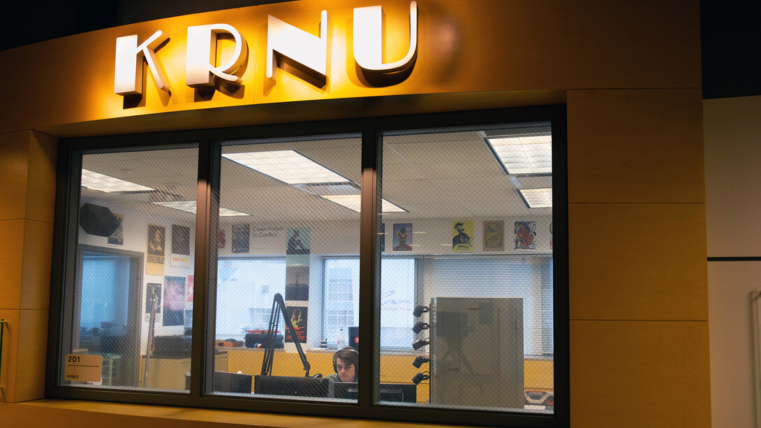 A student works inside the College of Journalism and Mass Communications' KRNU studio. The station is located in Andersen Hall.