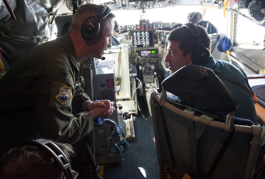 Hank Bounds, president of the NU system, talks with a member of Nebraska National Guard's 155th Air Refueling Wing during the May 24 flight.