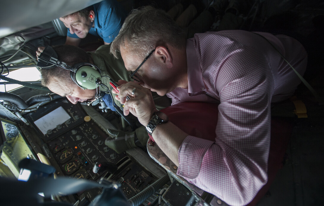 Chancellor Ronnie Green (front) and NU President Hank Bounds (back) observe refueling operations from the Stratotanker cockpit during the civic leader flight.