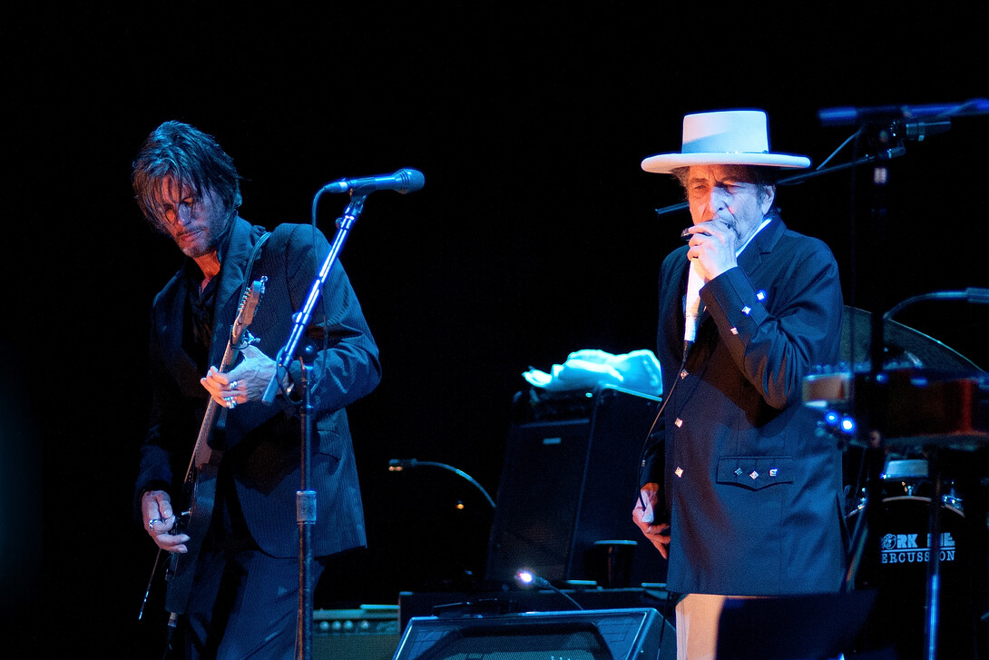 Bob Dylan (right) sings during a 2012 concert in Spain.