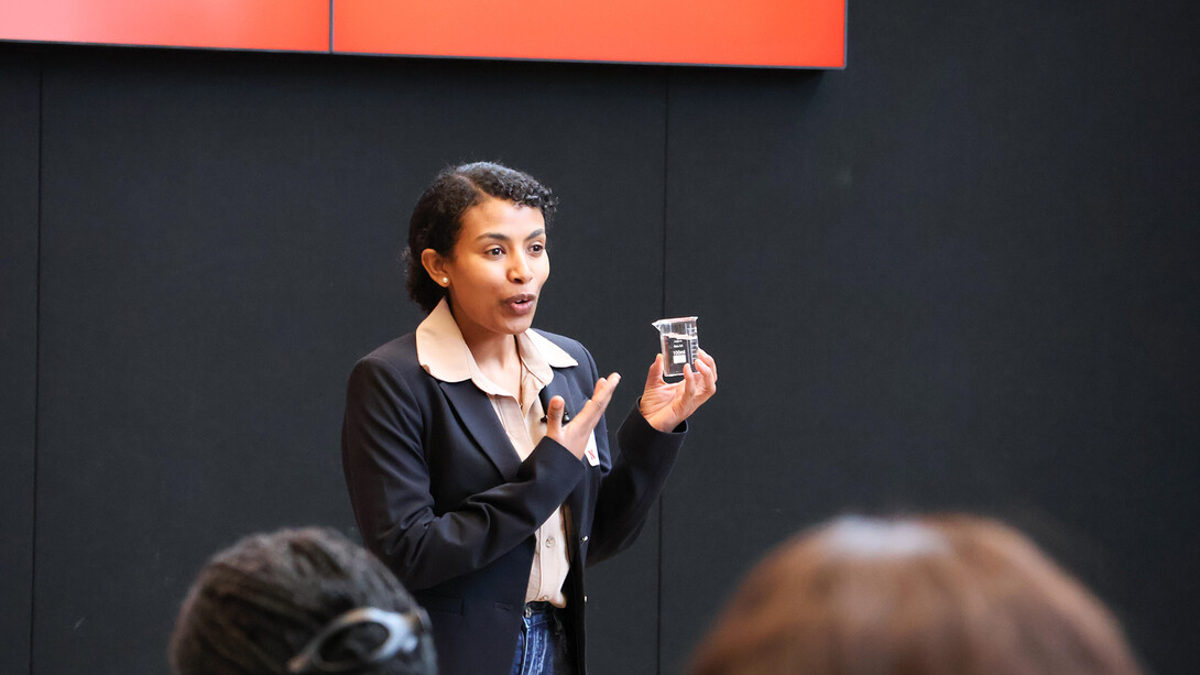 Zenebu Derbew, a graduate student in civil and environmental engineering, presents on stage during the Student Research Days Slam at the University of Nebraska–Lincoln on April 9.