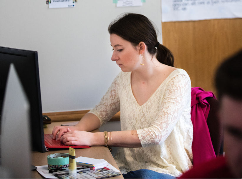 Sydney Goldberg, a student in the Raikes School, works on the Build Your Character app.