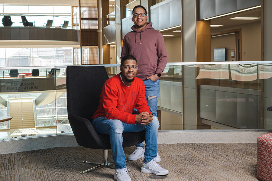 Terry Arvie’s brother, Ra’Daniel (right), a junior management major, also attends the College of Business. Both are also part of a sibling singing group, The Arvies, who recently launched their first single.